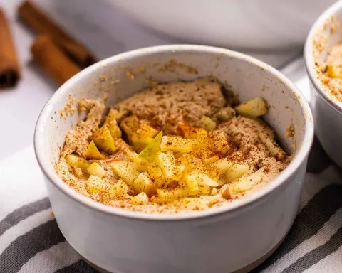 apple pie microwave baked oats in a bowl